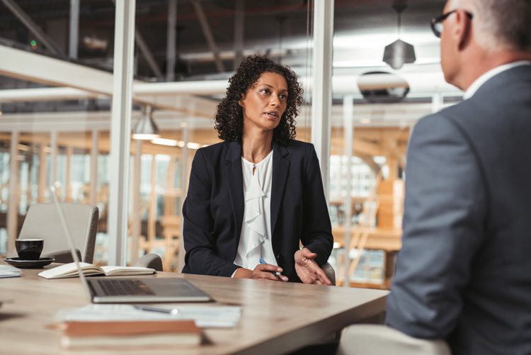 business man and woman having discussion - boss