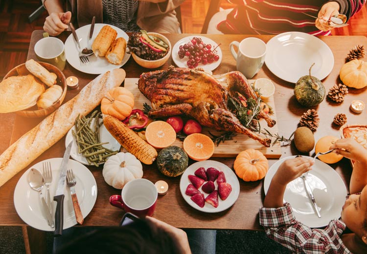 small family Thanksgiving meal - table and food - gratitude