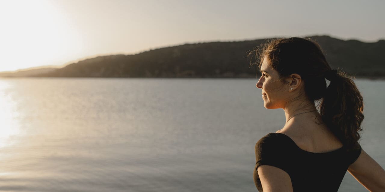 Woman looking at a lake