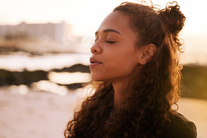 A woman taking a breath.