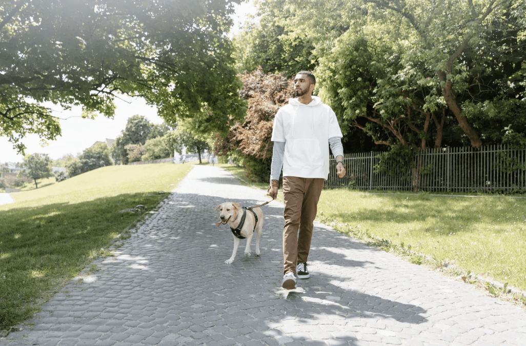 A man walking his dog.