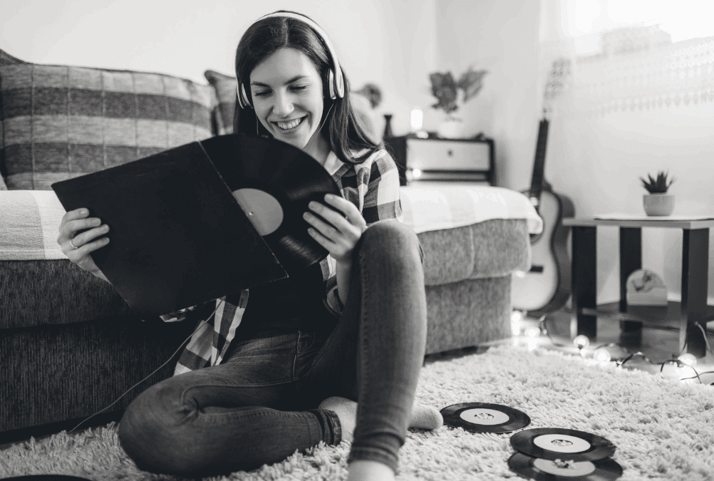 A woman listening to records.