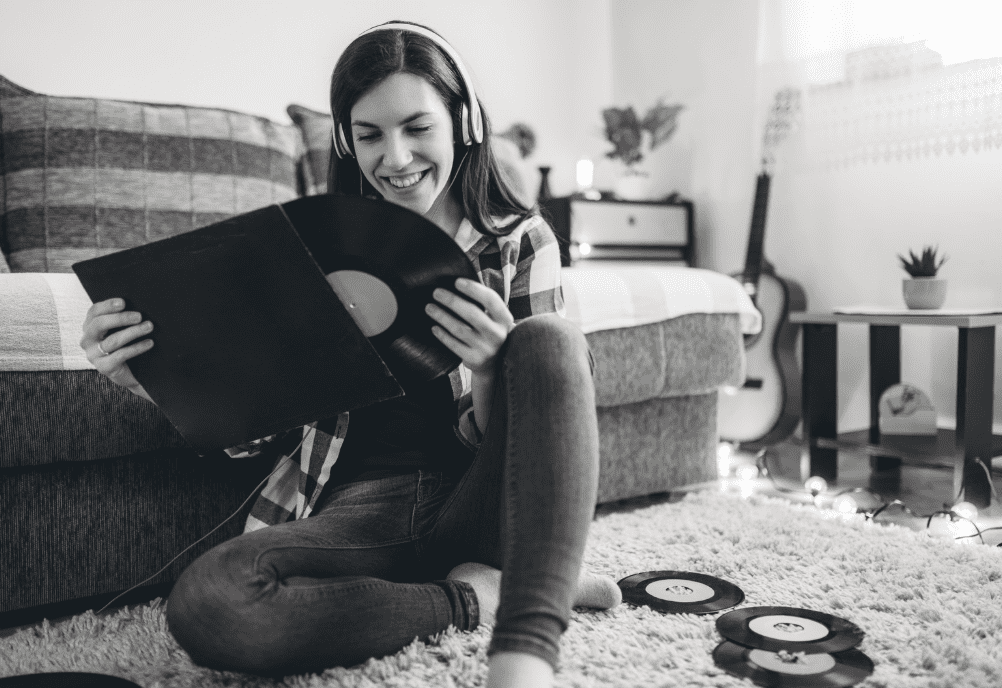 A woman listening to records.